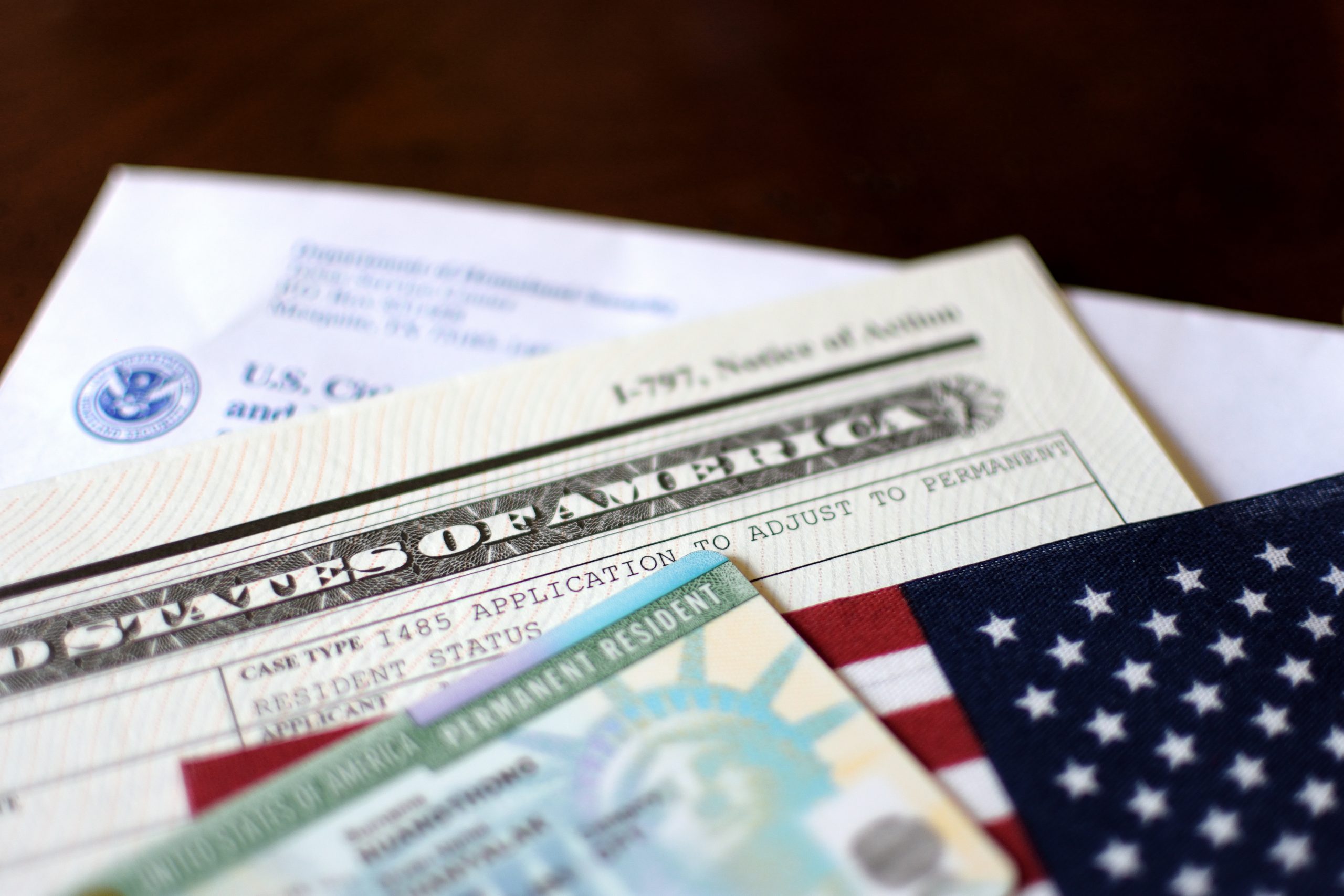 A close up of several different papers with us and american flags