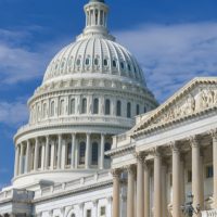 A close up of the capitol building with columns