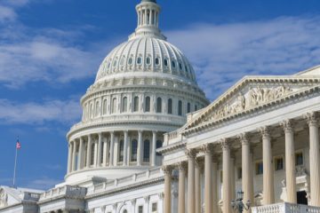 A close up of the capitol building with columns