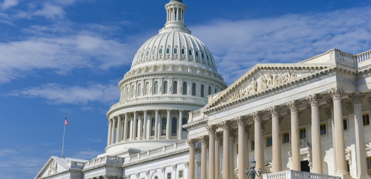 A close up of the capitol building with columns