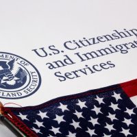 A close up of the u. S. Citizenship and immigration services logo