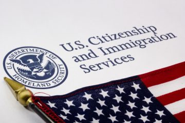 A close up of the u. S. Citizenship and immigration services logo