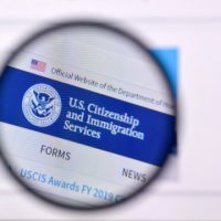A close up of the uscis logo on a computer screen.