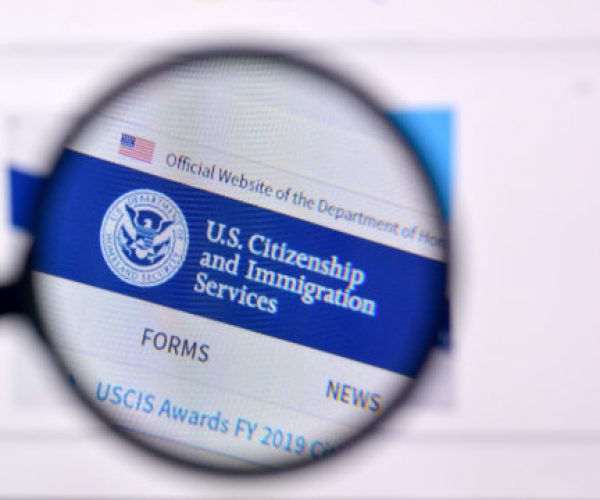 A close up of the uscis logo on a computer screen.