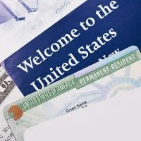 A close up of the welcome to the united states sign.