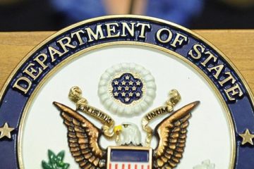 A close up of the seal of the us department of state