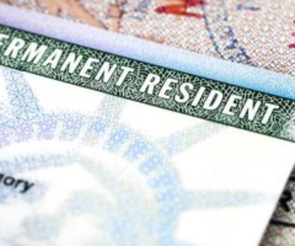 A close up of the permanent resident card