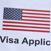 A close up of the usa flag on a visa application