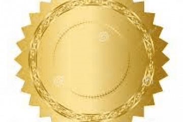 A gold seal with a circle in the middle.